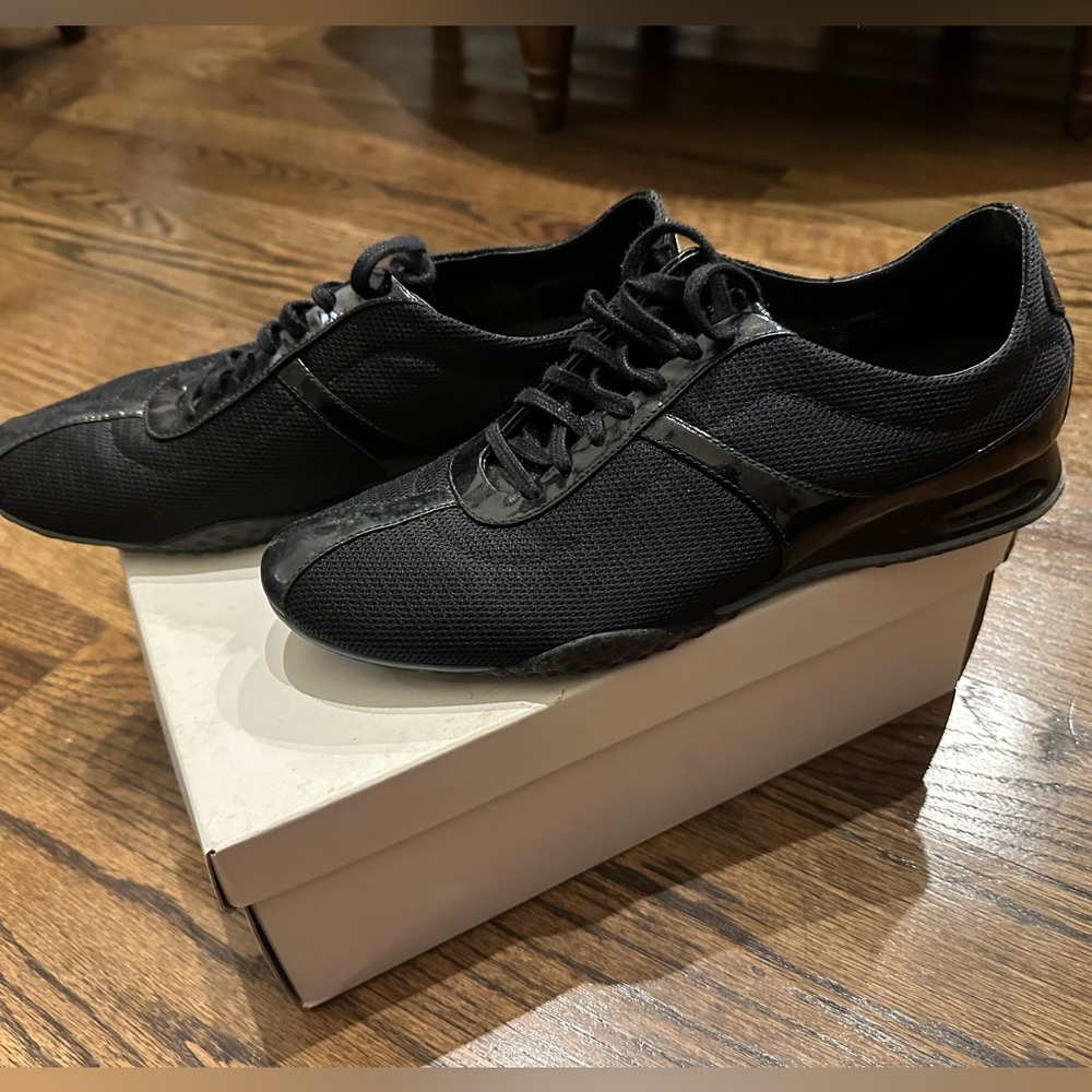 Black Coke Haan tennis shoes